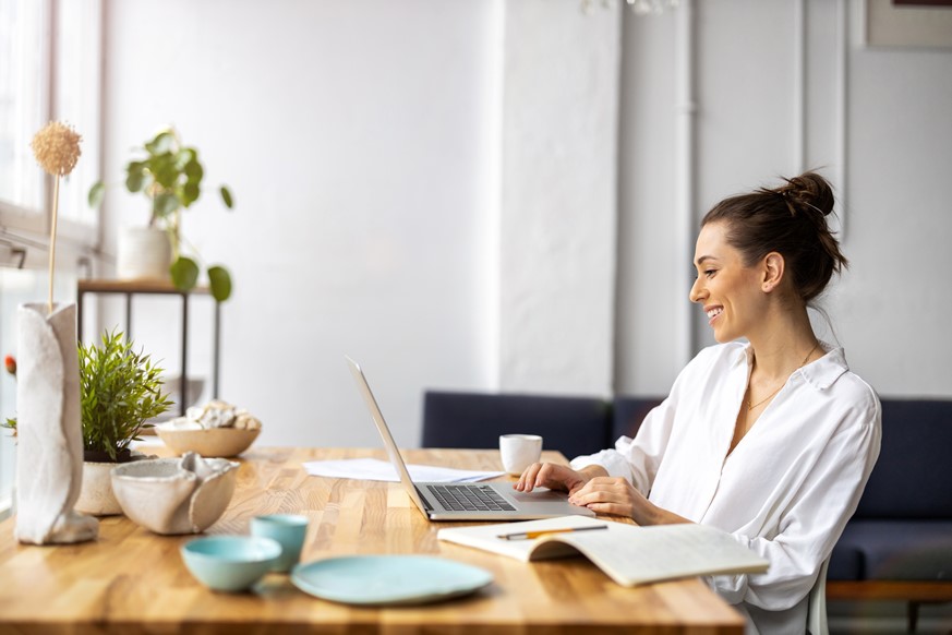 Woman working remotely, managing tasks and projects efficiently